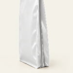 Close-up of the folded side gusset on a matte white laminated side gusset bag