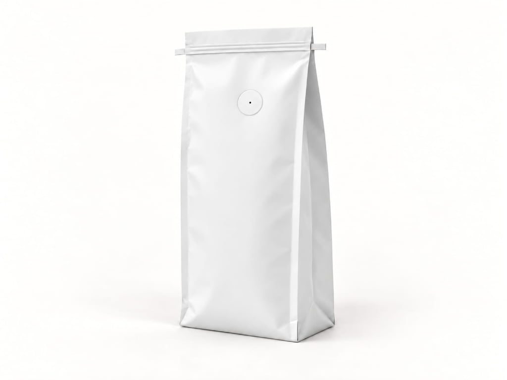 Matte white laminated side gusset bag showing a tin tie, centered degassing valve, front panel, side gusset and folded bottom